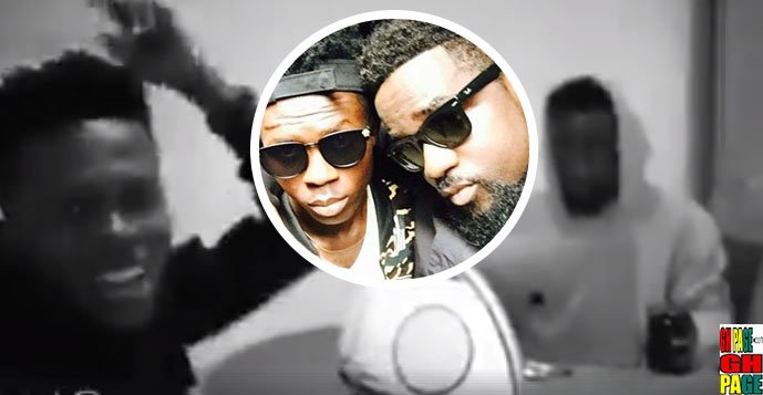 Strongman in a fierce rap battle with Sarkodie in 2017 Rapperholic promo video