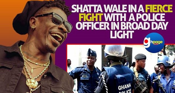 Video: Shatta Wale in a fierce fight with a Police Officer in broad day light