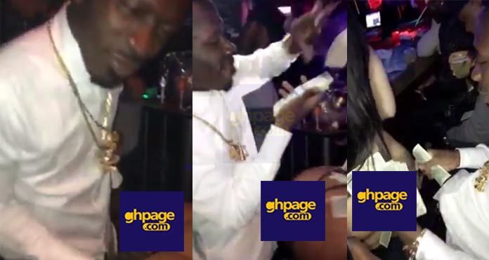 Video: Shatta Wale shows his money power as he spends dollars on a stripper in a club