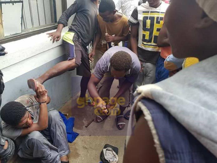 Photos: Young man beaten to stupor for robbing woman of her ATM card
