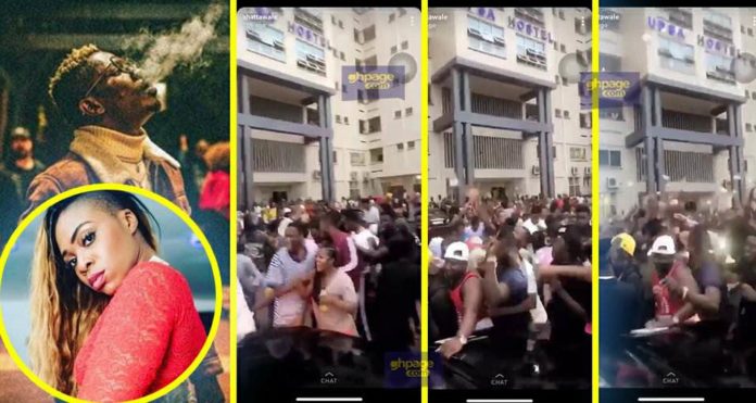 Video: Shatta Wale throws money into a crowd of fans at UPSA hostel; says it's better to spend it that way than on an ungrateful Michy