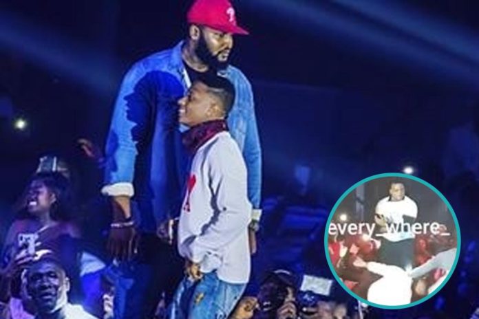 Die-hard fan of Wizkid fights bodyguards just to touch him