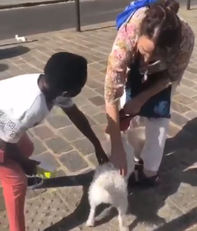 My dog's name is Shatta- Yaw Dabo tells a white woman as he chills in France