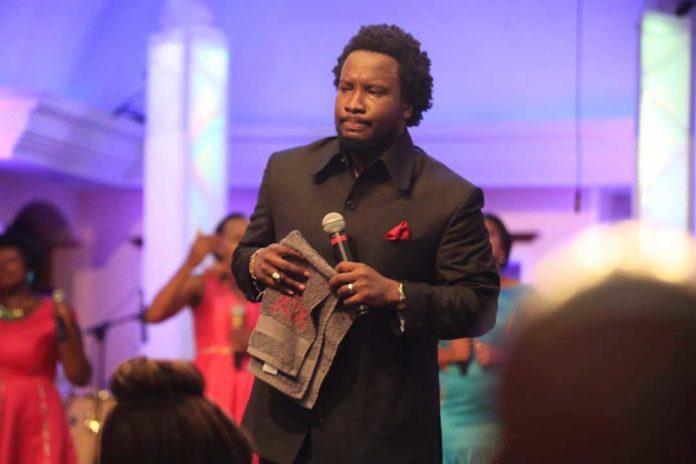 Sonnie Badu receives a brand new Mercedes car from church members