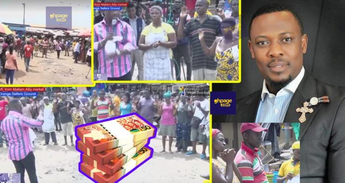 Prophet Nigel Gaisie shares money at Mallam Attah Market