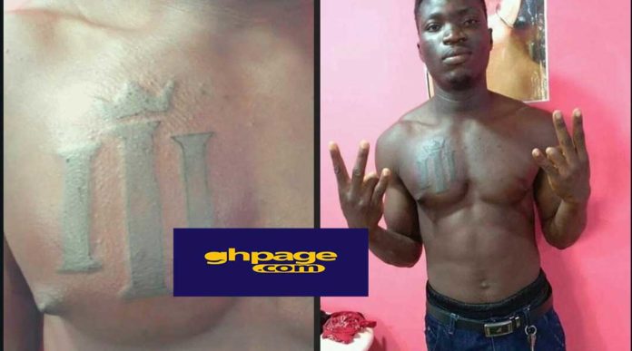 Shatta Wale fan tattoos Reign album art on his chest