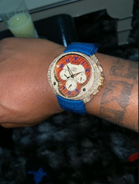 Davido flaunts his newly acquired expensive diamond encrusted wristwatch