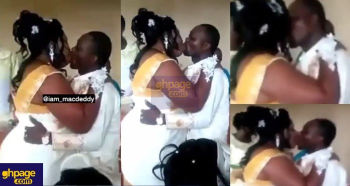 Couple breaks the internet with a 'wild' kiss on their wedding day