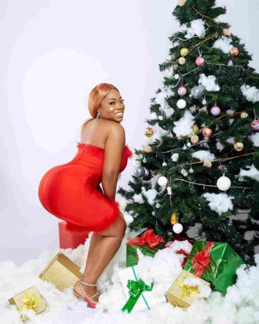 Actress in a picture with Christmas tree