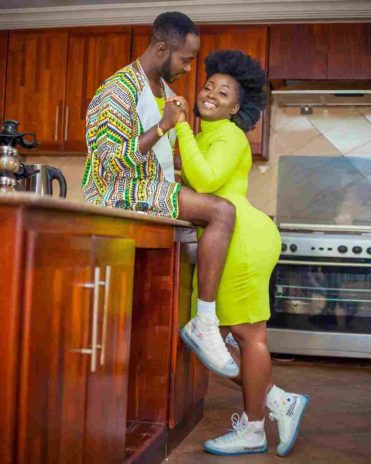 Okyeame Kwame and wife in a photo 