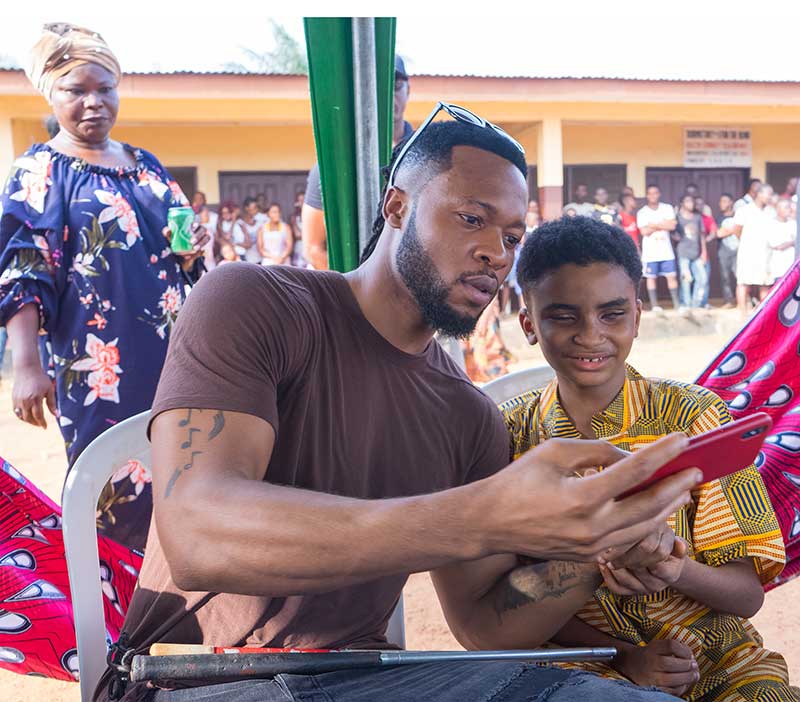 Flavour with his 'adopted' son Semah