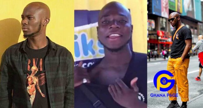Photos: Meet King Promise's 'twin brother' who has tattooed his name on his chest