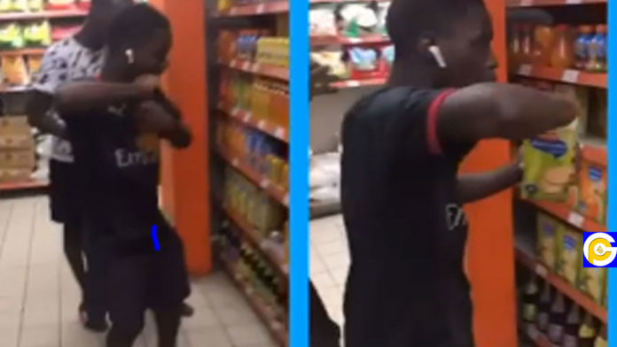 Two-boys-caught-on-camera-drinking-almost-all-the-drinks-at-a-mall-(Video)