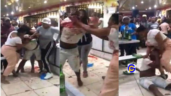 Wife-mercilessly-beats-her-hubby--after-catching-him-with-side-chick-enjoying-at-restaurant-Video