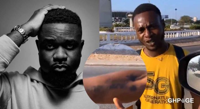 Sarkodie's-reaction-after-meeting-die-hard-fan-who-tattoed-his-name-on-his-arms