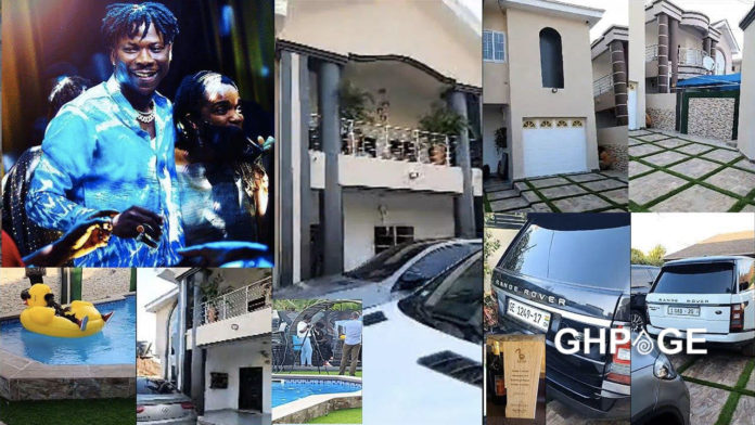 Stonebwoy shows off his mansion and expensive cars