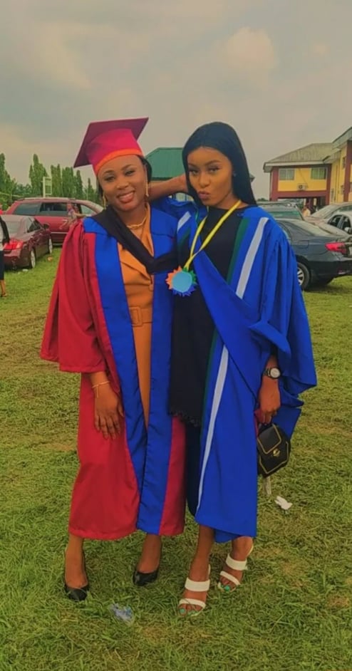 Man graduates with both daughters