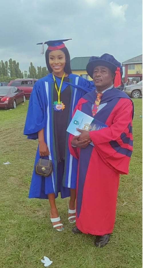Man graduates with both daughters