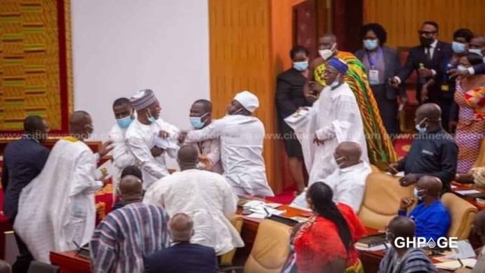 Exchange of blows in parliament as NPP and NDC MPs fight over who takes Majority side