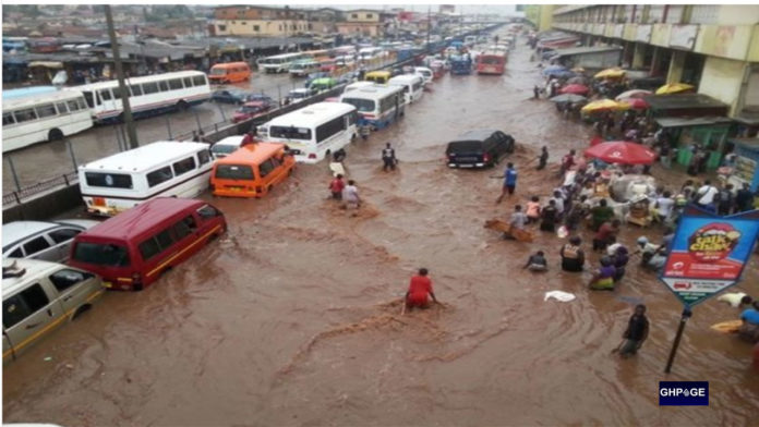 PHOTOS: After a few minutes of rain, the multimillion-dollar new Kejetia market was flooded.
