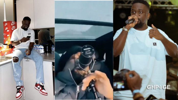 Sarkodie records in a moving car
