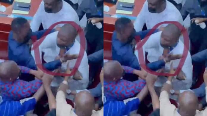 Photo of Sports Minister Mustapha Ussif receiving slaps during scuffle in parliament goes viral 