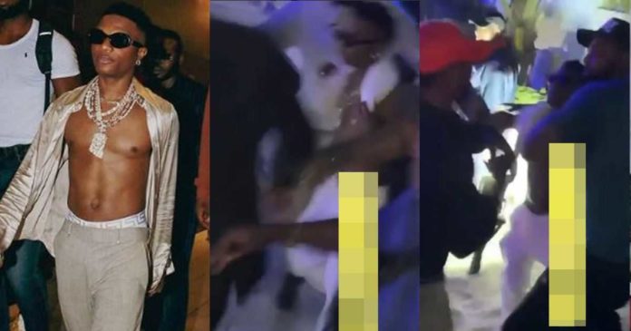 Wizkid gets physical with fan who tried snatching his diamond pendant [Video]