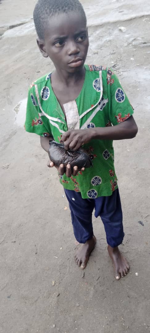 Kind man transforms life of poor kid he saw collecting scraps, enrols him in school [Photos]