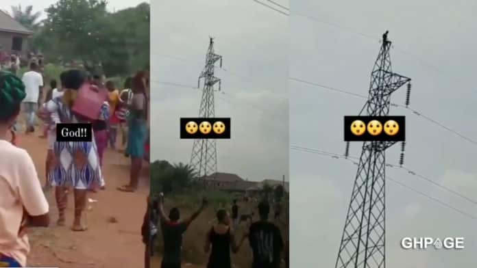 Village folks gather to catch glimpse of an alleged witch who was stuck on high tension pole