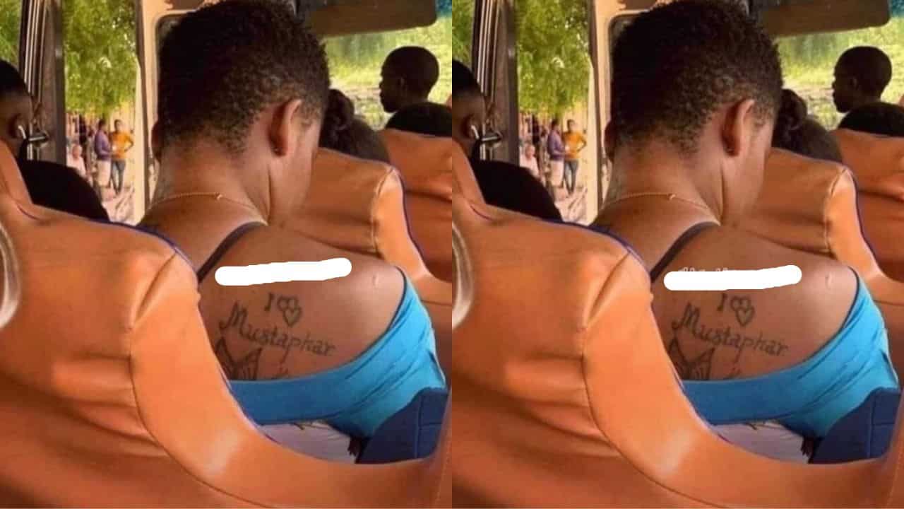 Lady tattoos her boyfriend's name on her back