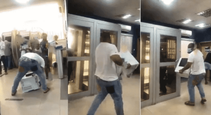 Angry man carries bank's printer away over failure to refund his missing money after two months [Video]