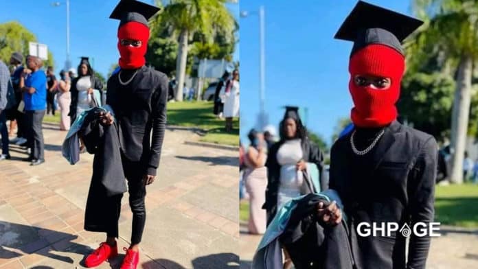 student wears mask during graduation