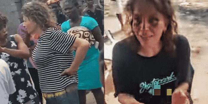 American lady goes 'mad' after yahoo boy tricked her to come to Lagos