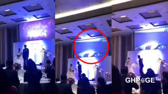 Groom plays video of bride cheating on giant screen on their wedding day