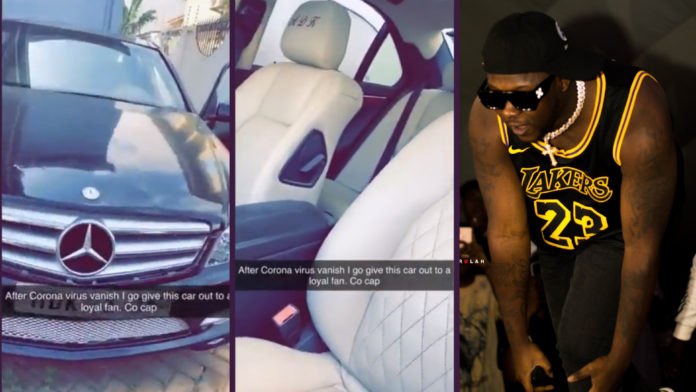 Medikal called out for failing to give Benz car he promised fan