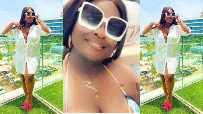 You're now turning into a slayqueen - Ghanaians blast Jackie Appiah for showing cleavage in a new vacation video rocking a bikini