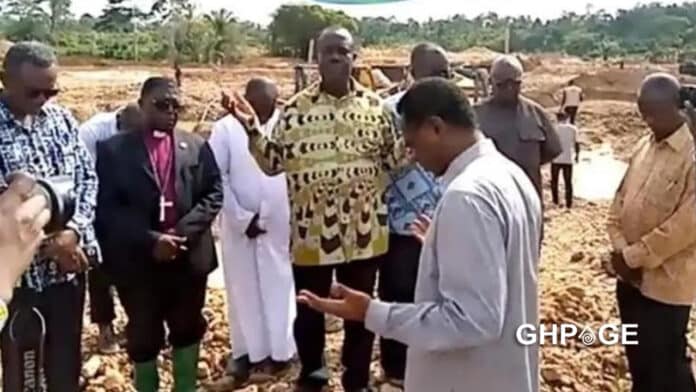 clergy praying at galamsey site