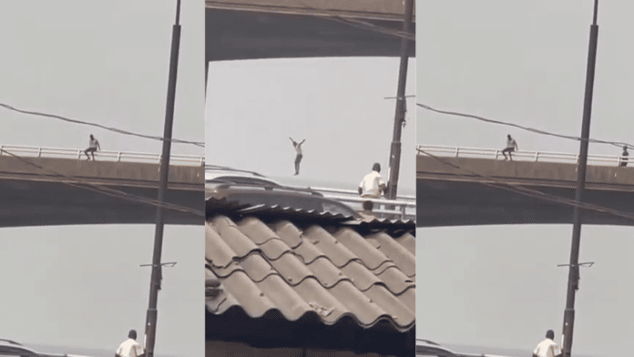Guy commits suicide by jumping off an overhead bridge