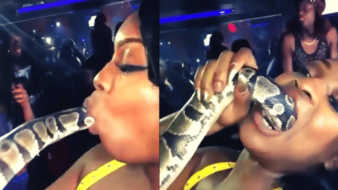 Video of a lady swallowing a live snake