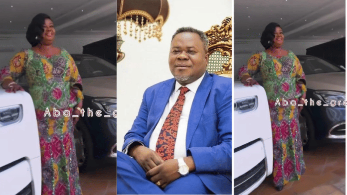 Dr Kwaku Oteng's first wife stands pretty inside garage full of expensive cars
