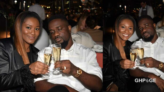 Sarkodie-and-Tracy-Sarkcess snipping wine