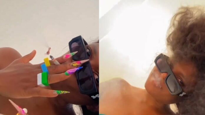 Abena Korkor returns to the 'world'; Smokes like she has two lungs in a new video