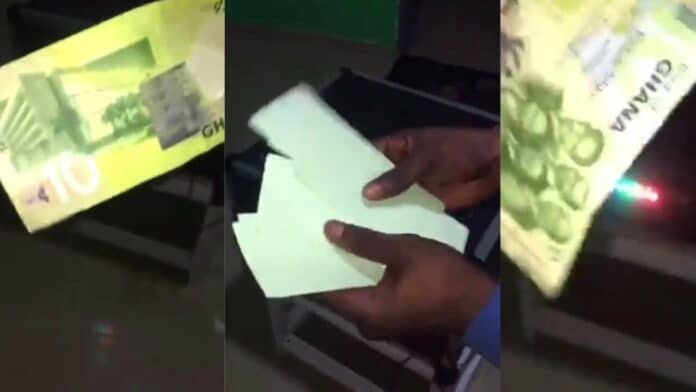 Video of a man printing Ghc 10 notes from the comfort of his room ...