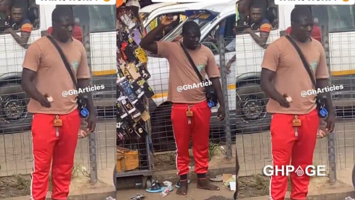 man curses phone scammers at Kumasi PZ