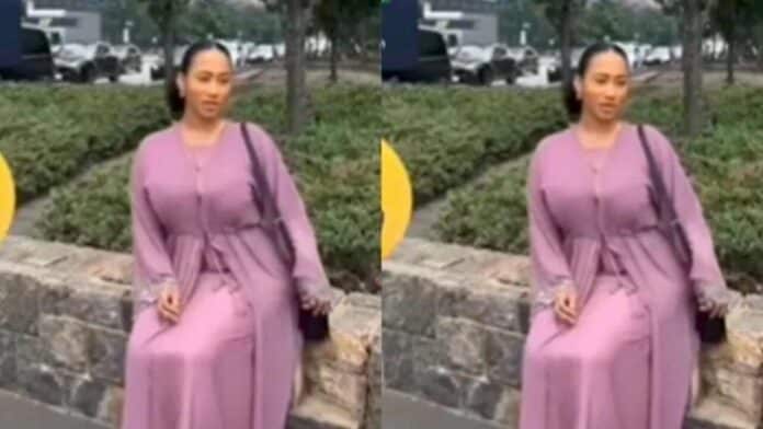 You can't fool us - Netizens expose Hajia4Real for stylishly covering her leg tracker in a new video