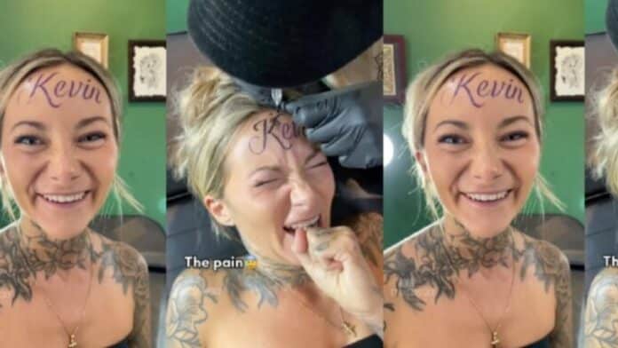 Lady happily tattoos her boyfriend's name on her forehead