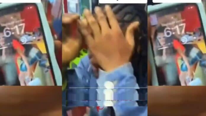 Lady receives serious beatings for stealing a Ghc 15 iPhone 11 phone cover - Video