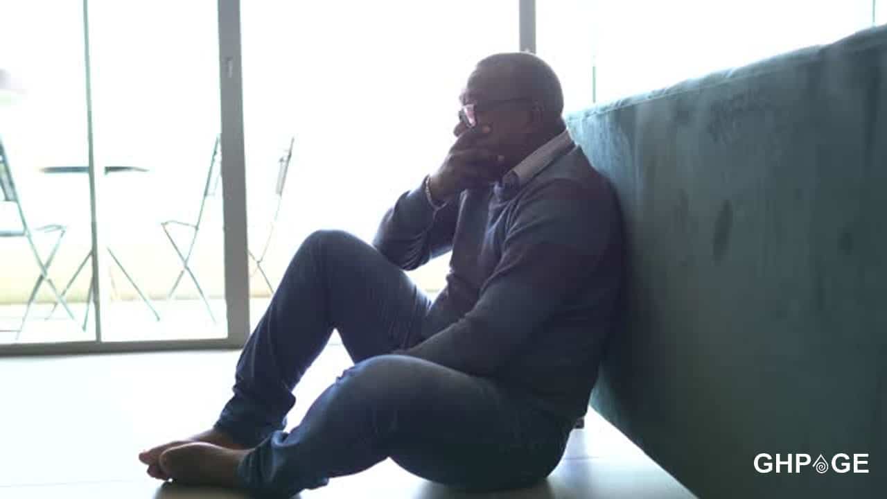 Man - GhPage Man sitting on the floor crying