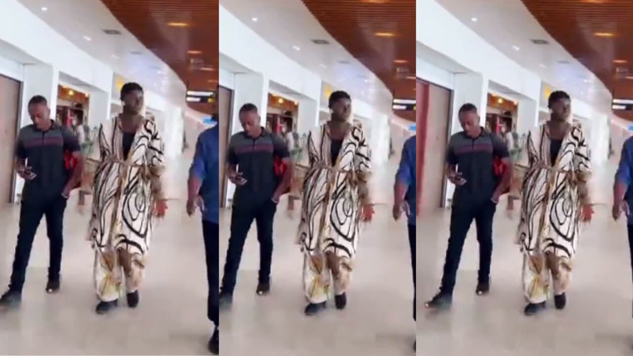 She has mumumized him - Ghanaians say as Afua Asantewaa's hubbby carries her bag while she walks empty-handed